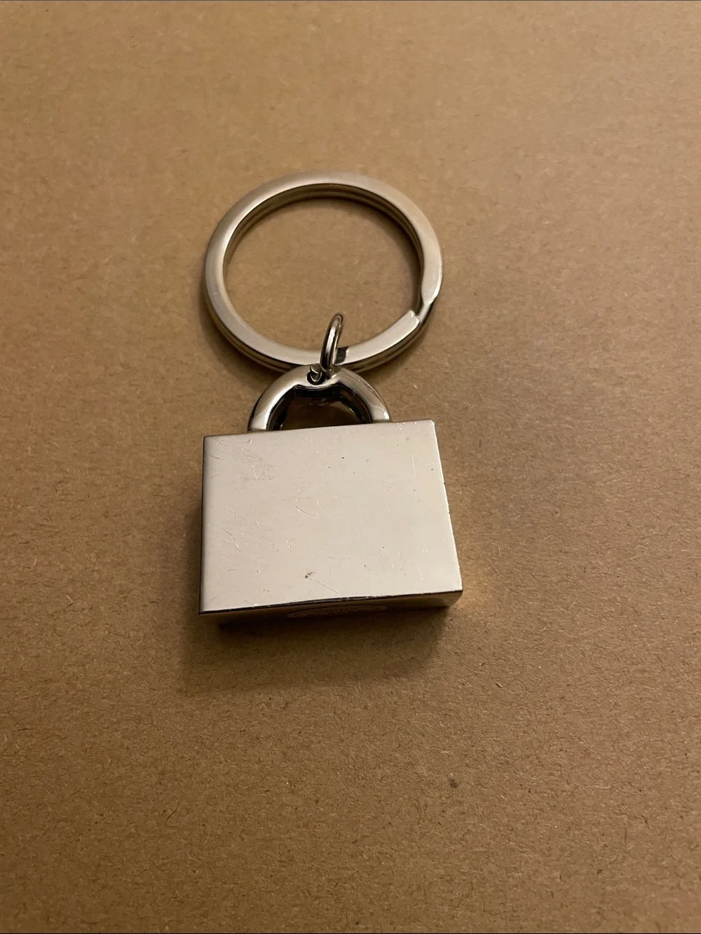 Golden Nugget Silver-tone Padlock Keychain